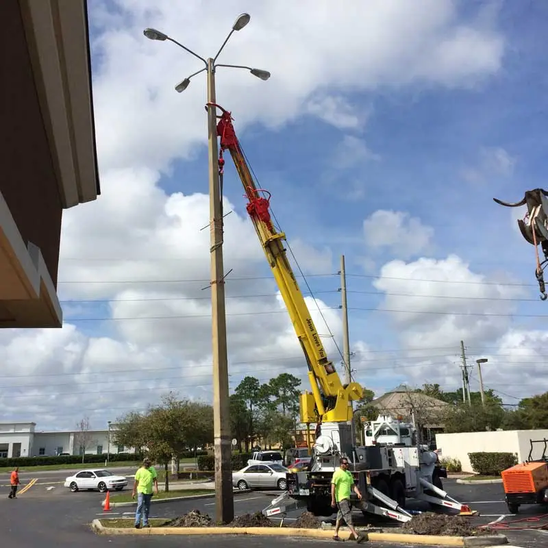 Parking lot lighting maintenance with bucket truck